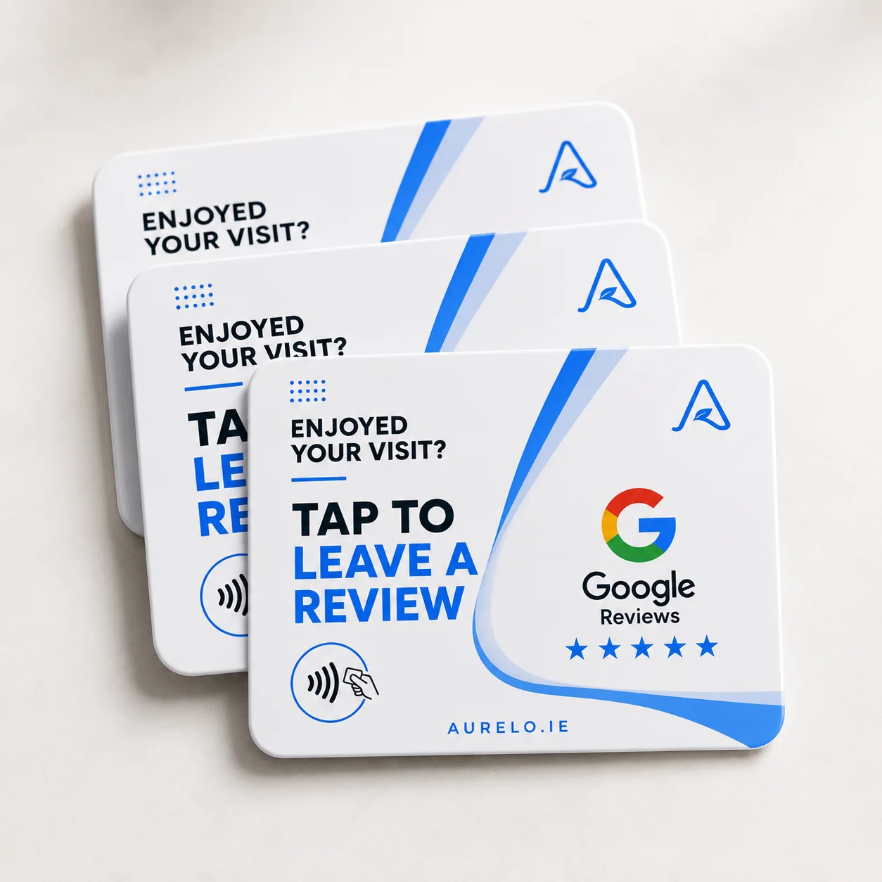 Three aurelo NFC Google review cards stacked on a pale surface.